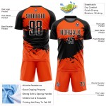 Aangepast oranje zwart-wit sublimatie voetbaltenue shirt